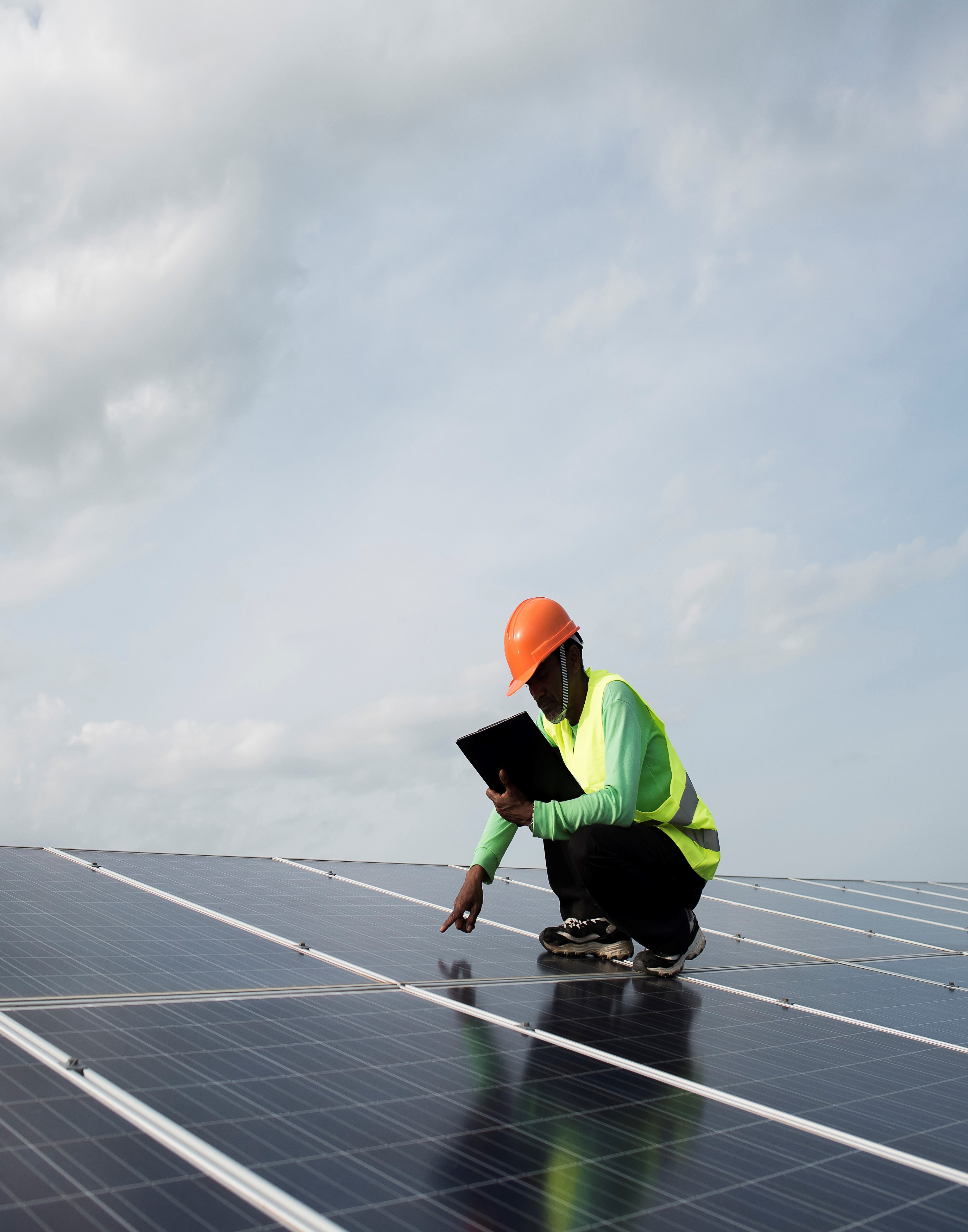 Technician engineer checks the maintenance of the solar cell pan